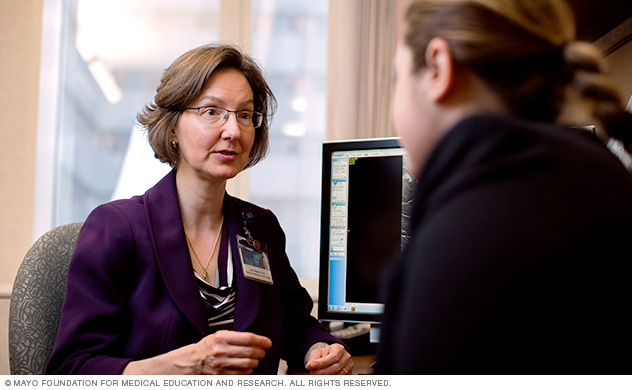 Surgeon meeting with a patient