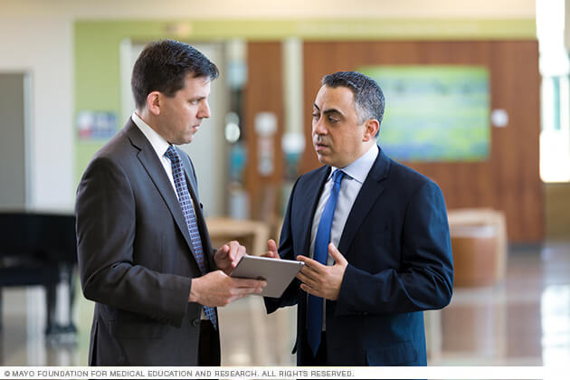 Mayo physicians collaborate on a course of patient care.